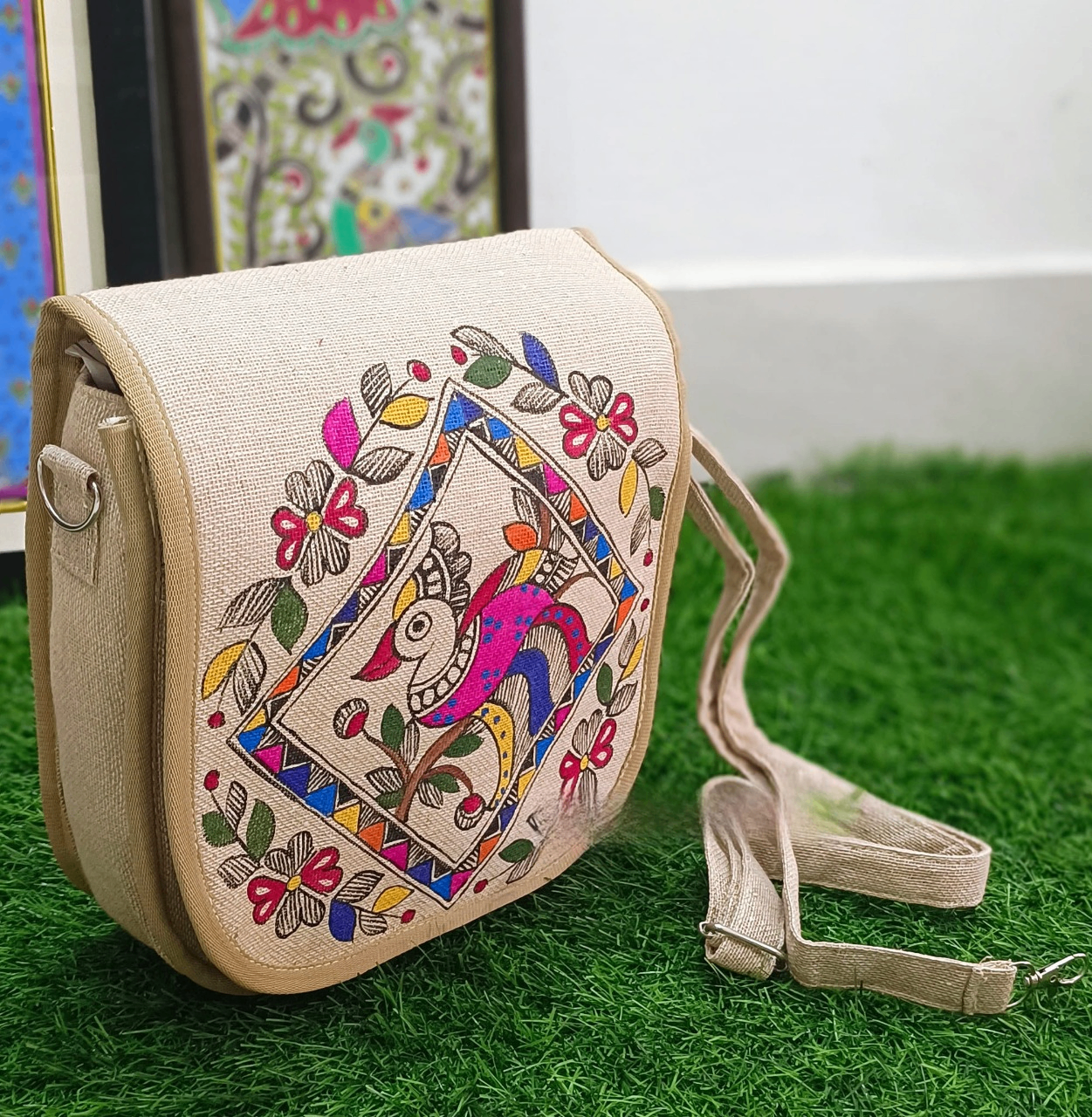 Hand-painted Madhubani jute bag with geometric bird artwork