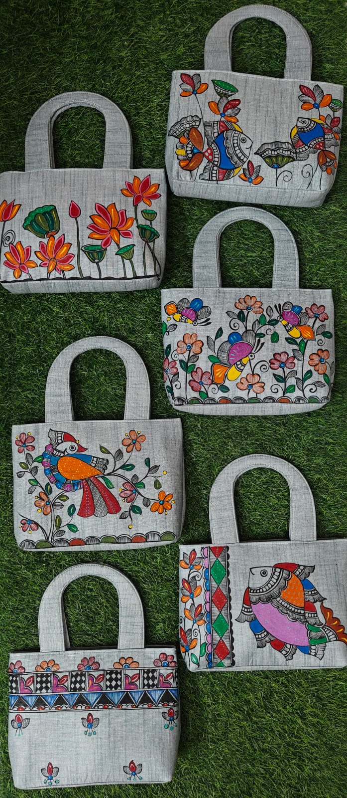 Madhubani painted khadi purses in grey with lotus, butterfly and bird motifs